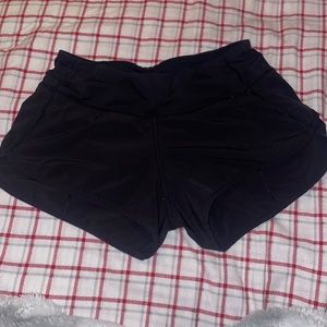 Black Lululemon speed up shorts size 2 , 2.5 in.